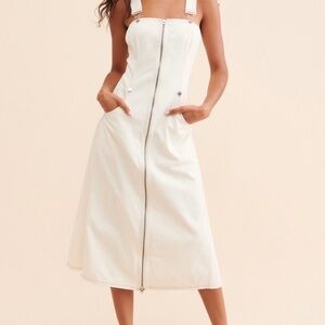 Anthropologie “Forever that Girl” ivory denim overall dress. Size extra small.